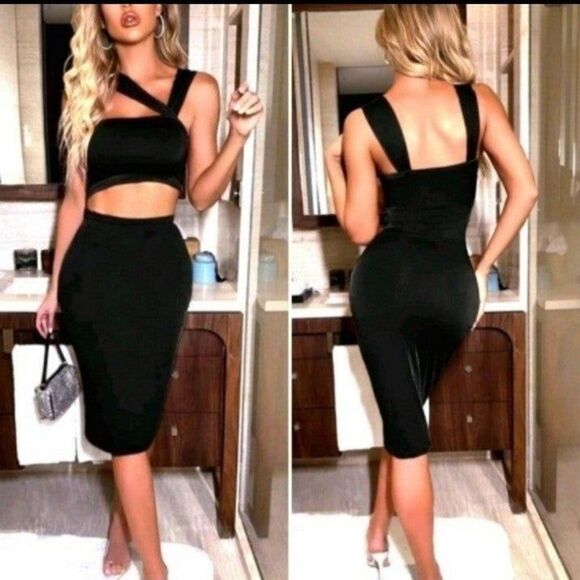 SEXY BLACK ASYMMETRICAL NECK CUT OUT DRESS SZ LARGE - Picture 1 of 6